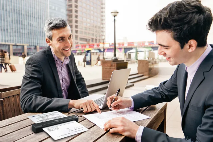 es50_business-men-outdoor-meeting.webp